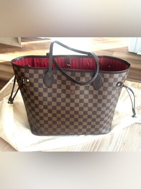 Louis Vuitton Neverfull MM in Damier Ebene with red striped interior